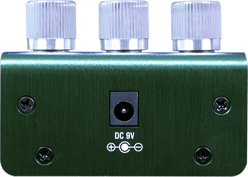 Back panel of the ZIO Bass: the DC 9V power jack, with the polarity symbol showing a negative tip and positive barrel